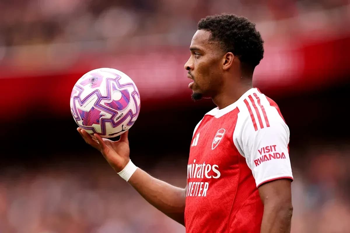 Player holding a soccer ball during match
