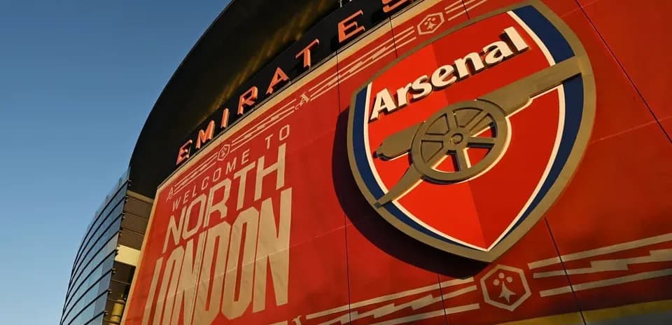 Emirates Stadium exterior featuring Arsenal logo
