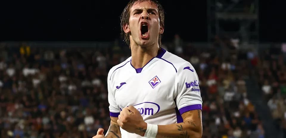 Fiorentina player celebrating a goal in match