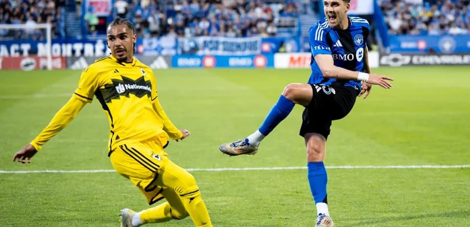 Player kicking ball during Columbus Crew match
