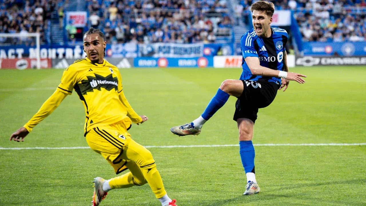 Player kicking ball during Columbus Crew match