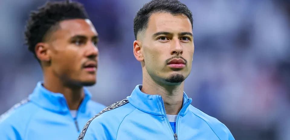Two players in Marseille training gear before match