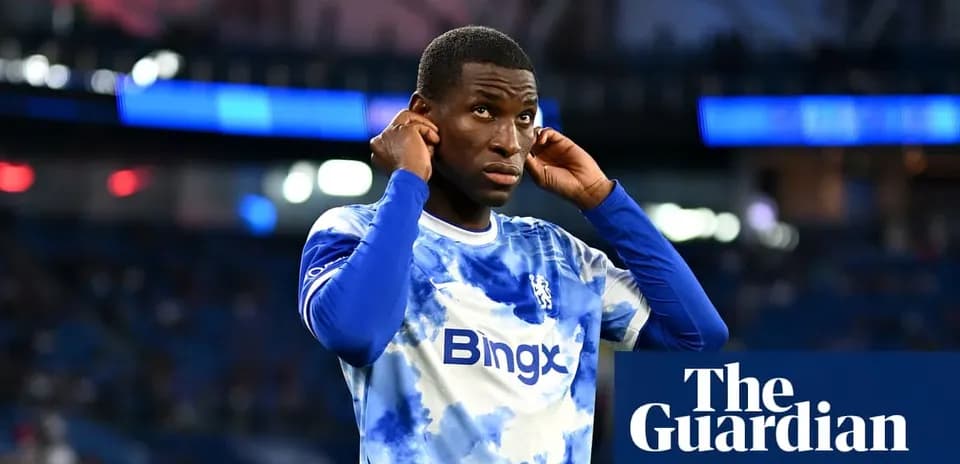 Player adjusting his earphones before match