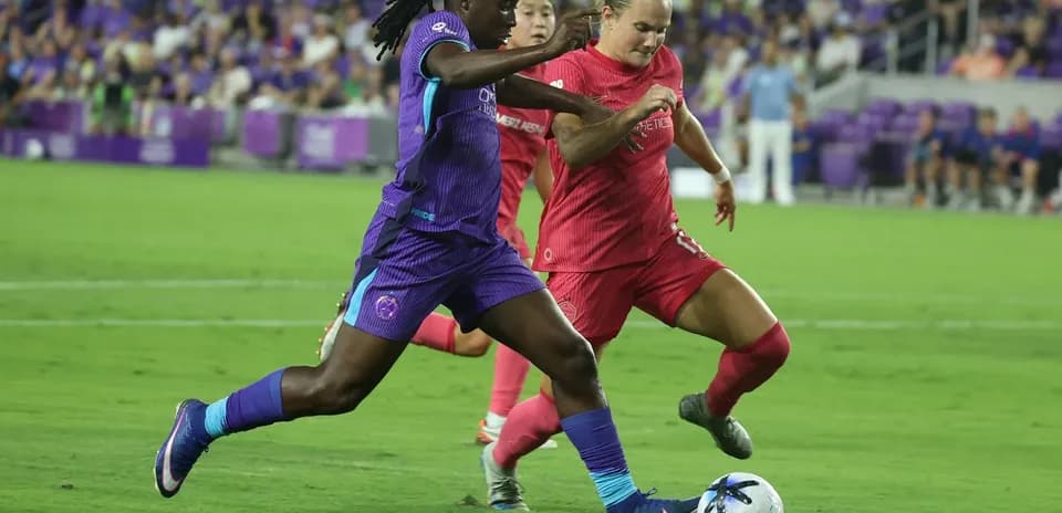 Boston Legacy W player dribbling against Orlando Pride W
