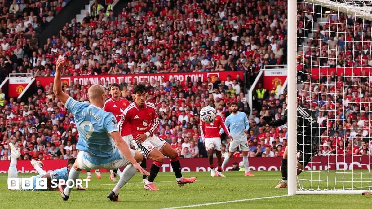 Players contesting a shot on goal during match