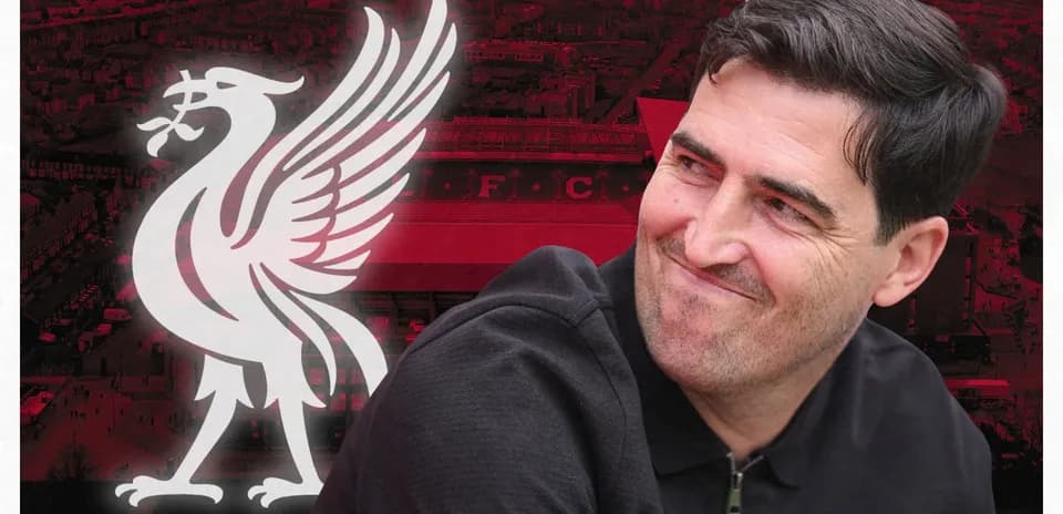 Man smiling with Liverpool FC logo background