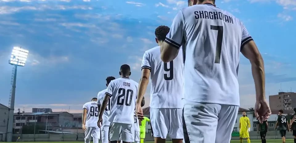 Players walking onto the pitch before match