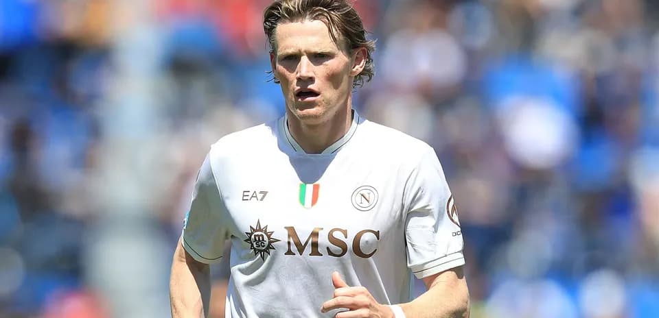 Player running on field in Napoli jersey