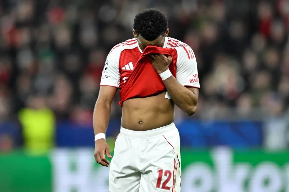 Player holding jersey to face during match