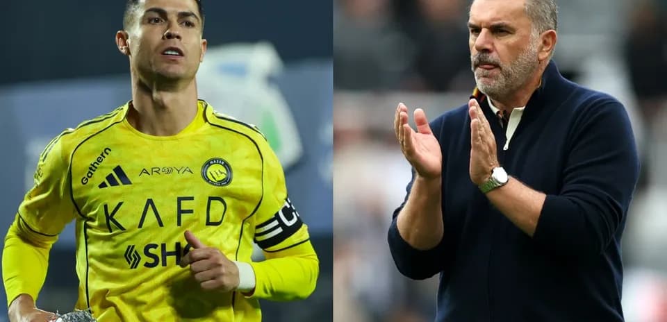 Cristiano Ronaldo and coach applauding during match