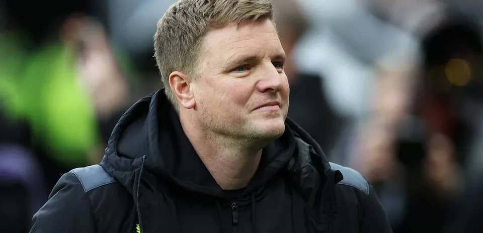 Coach observing from the sidelines during a match