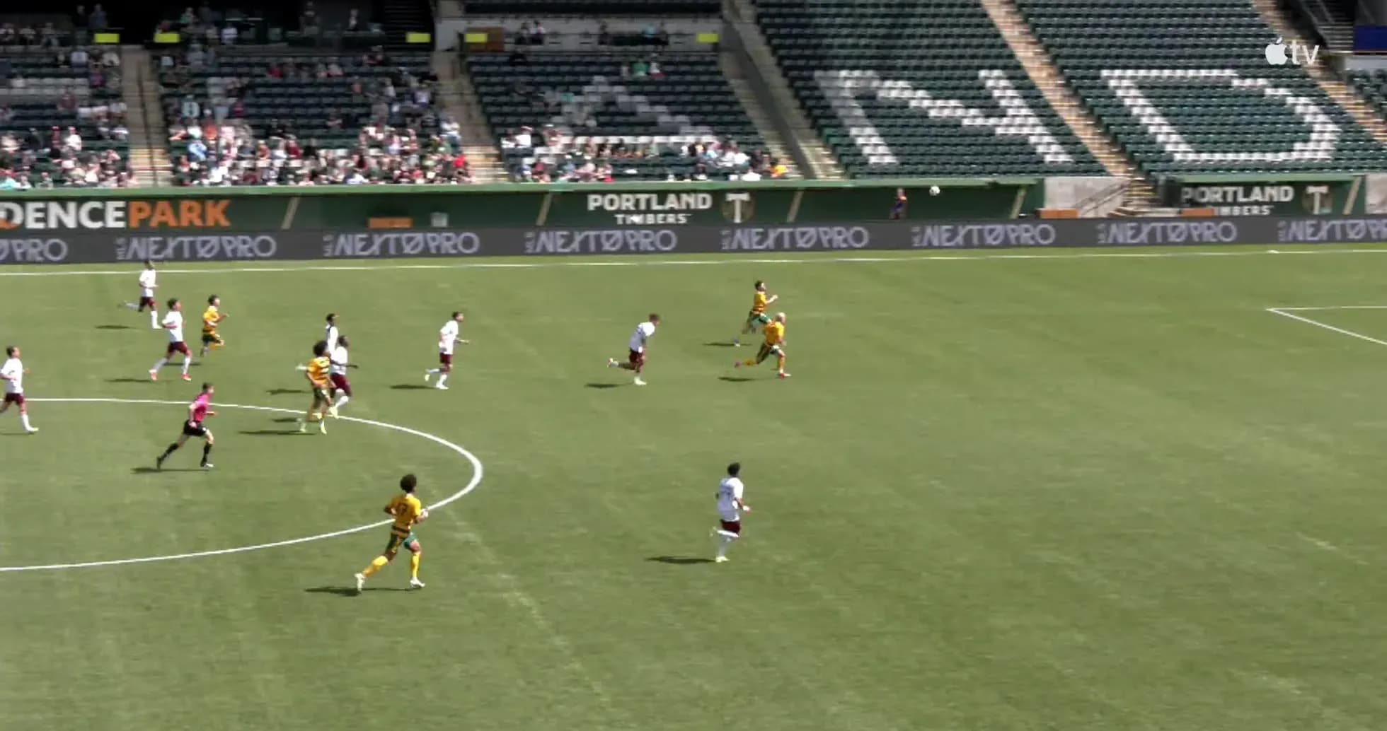 Players competing for the ball during match