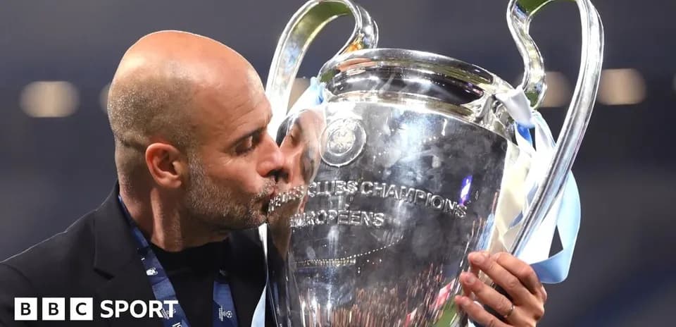 Manager kissing UEFA Champions League trophy