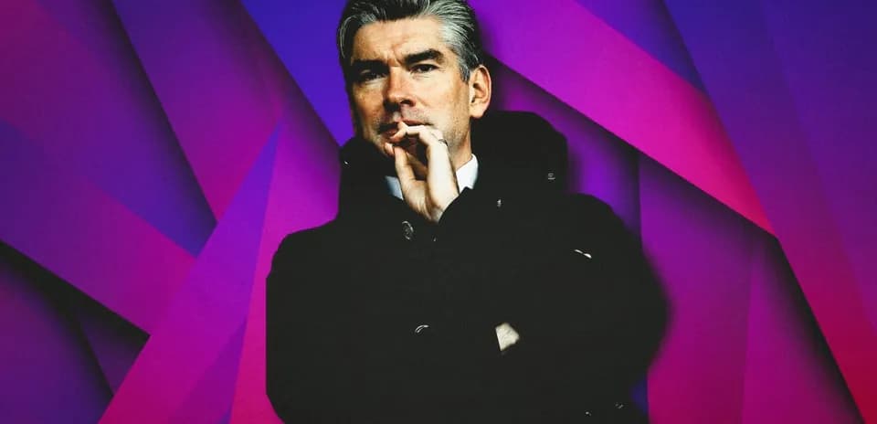 Man in a coat with a thoughtful expression