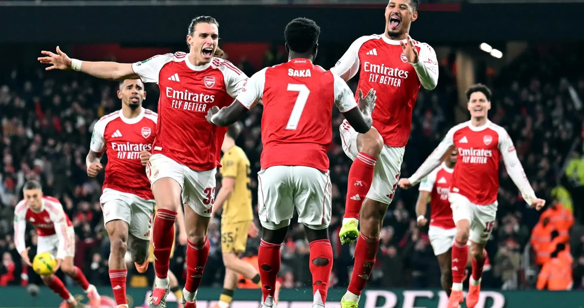 Arsenal players celebrating a goal during match