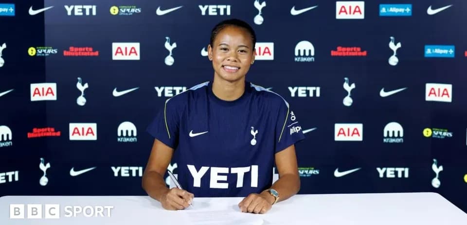 Player signing contract at Tottenham Hotspur announcement