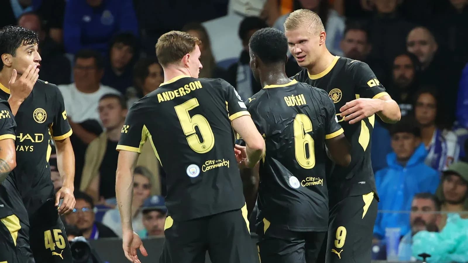 Players celebrating during a football match