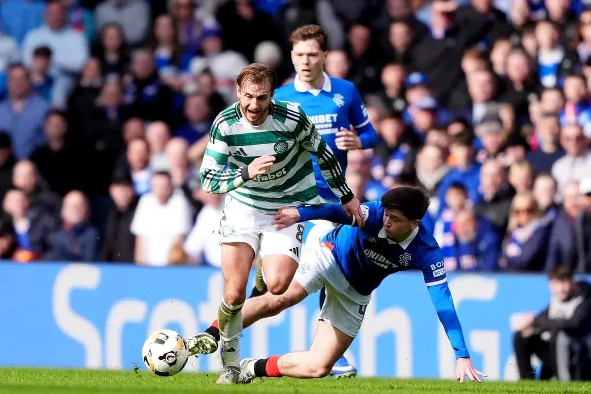Celtic player evading a tackle during match