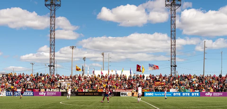 Fans cheering during Detroit City FC match
