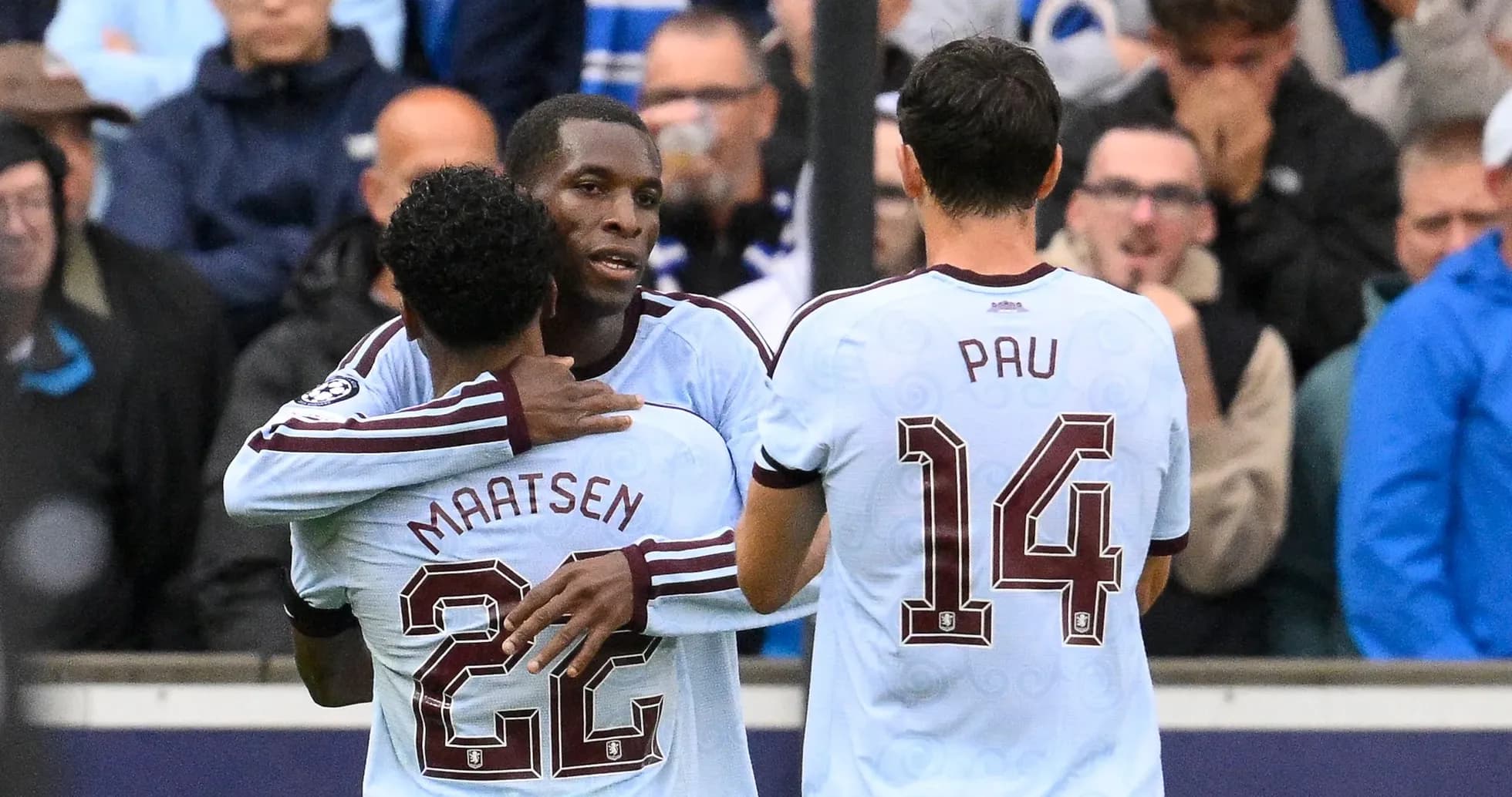 Players celebrating a goal on the pitch