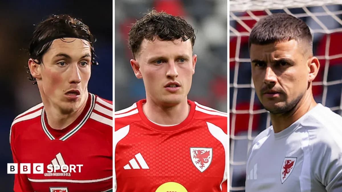 Three Welsh football players in team jerseys