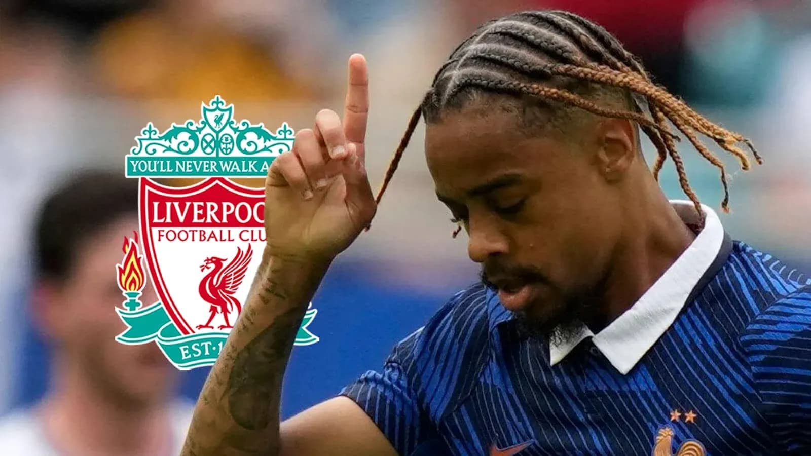Player celebrating with Liverpool logo in background