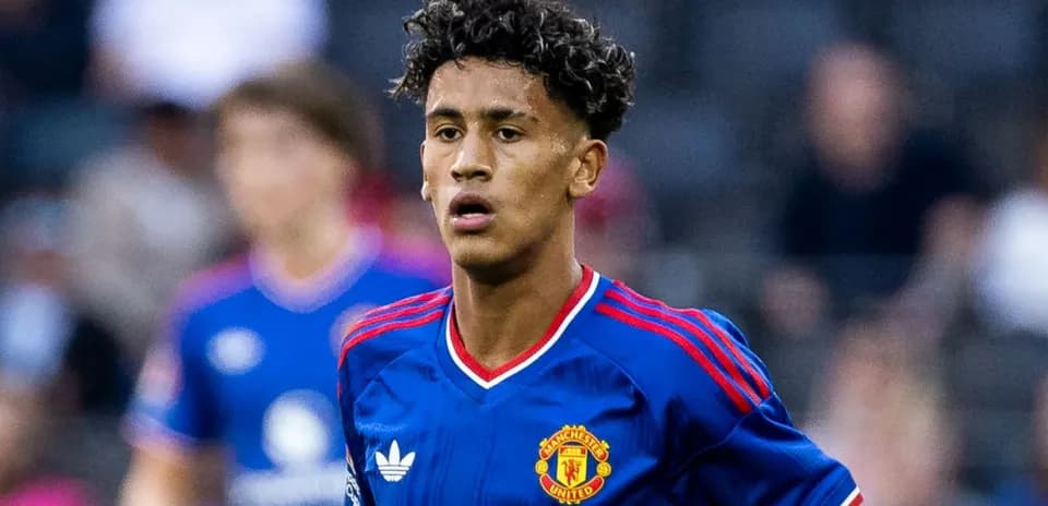 Young player in Manchester United jersey during match