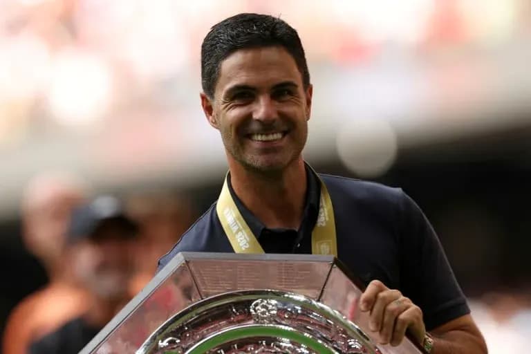 Manager holding trophy during celebration event