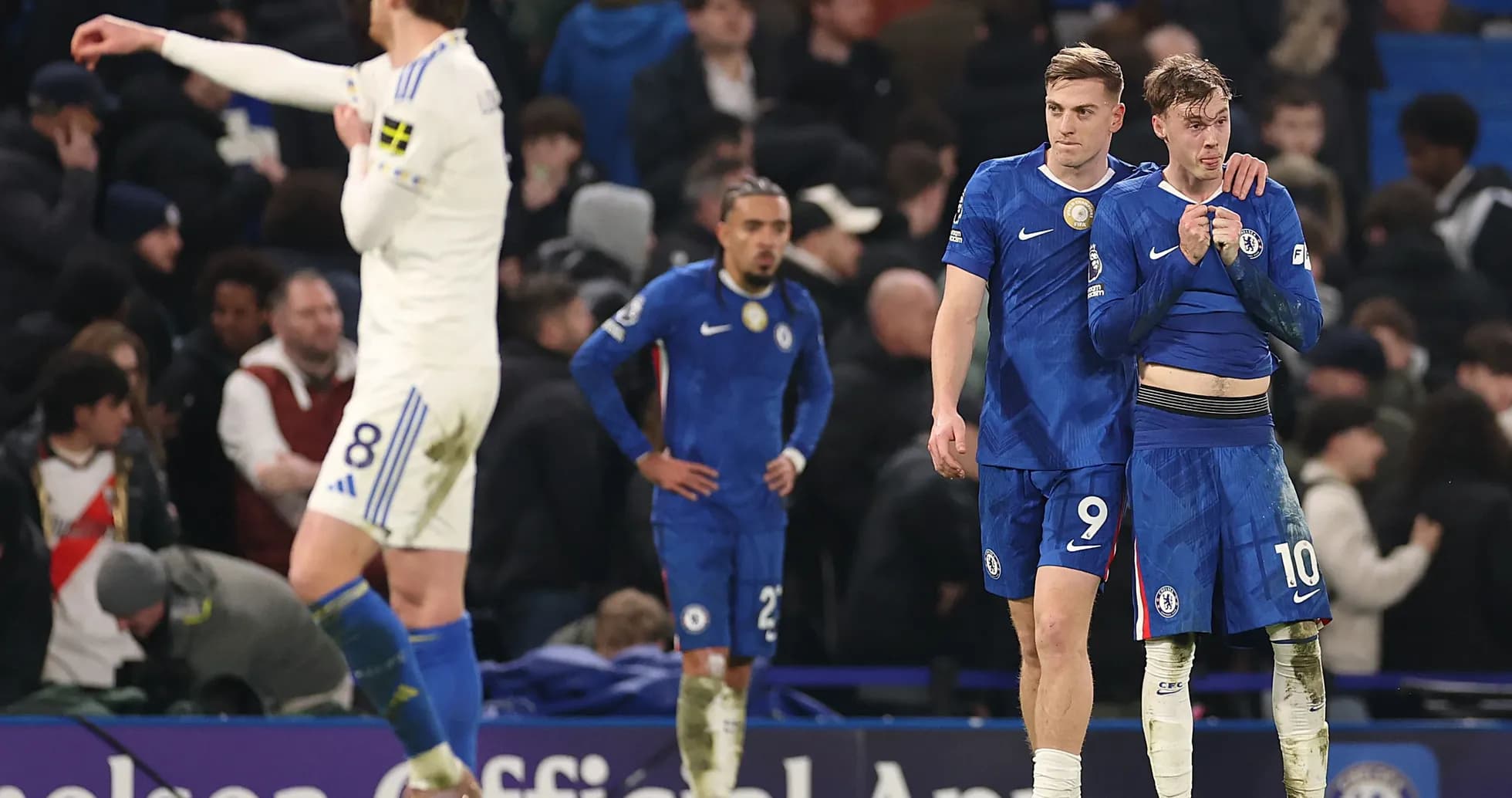 Chelsea players showing concern after match loss