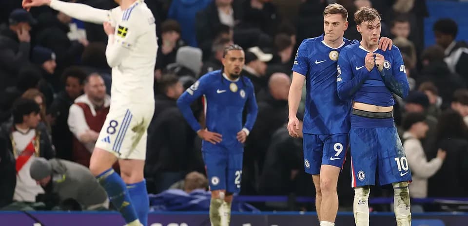 Chelsea players showing concern after match loss