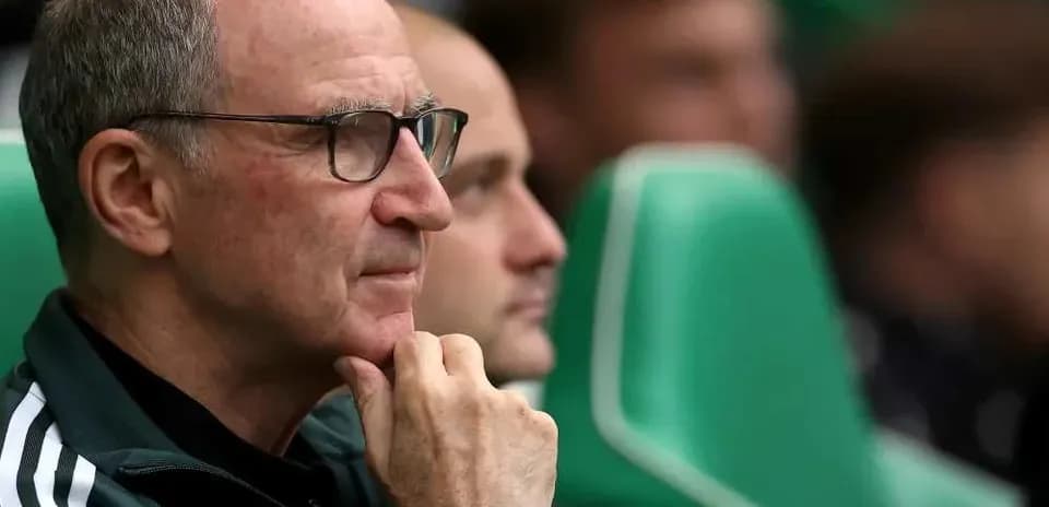 Coach observing the match from the sidelines