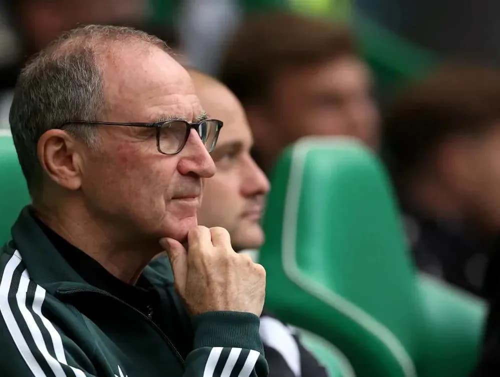 Coach observing the match from the sidelines