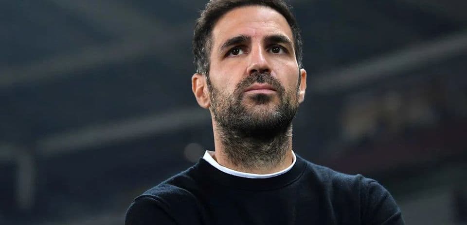 Coach observing the match from the sidelines