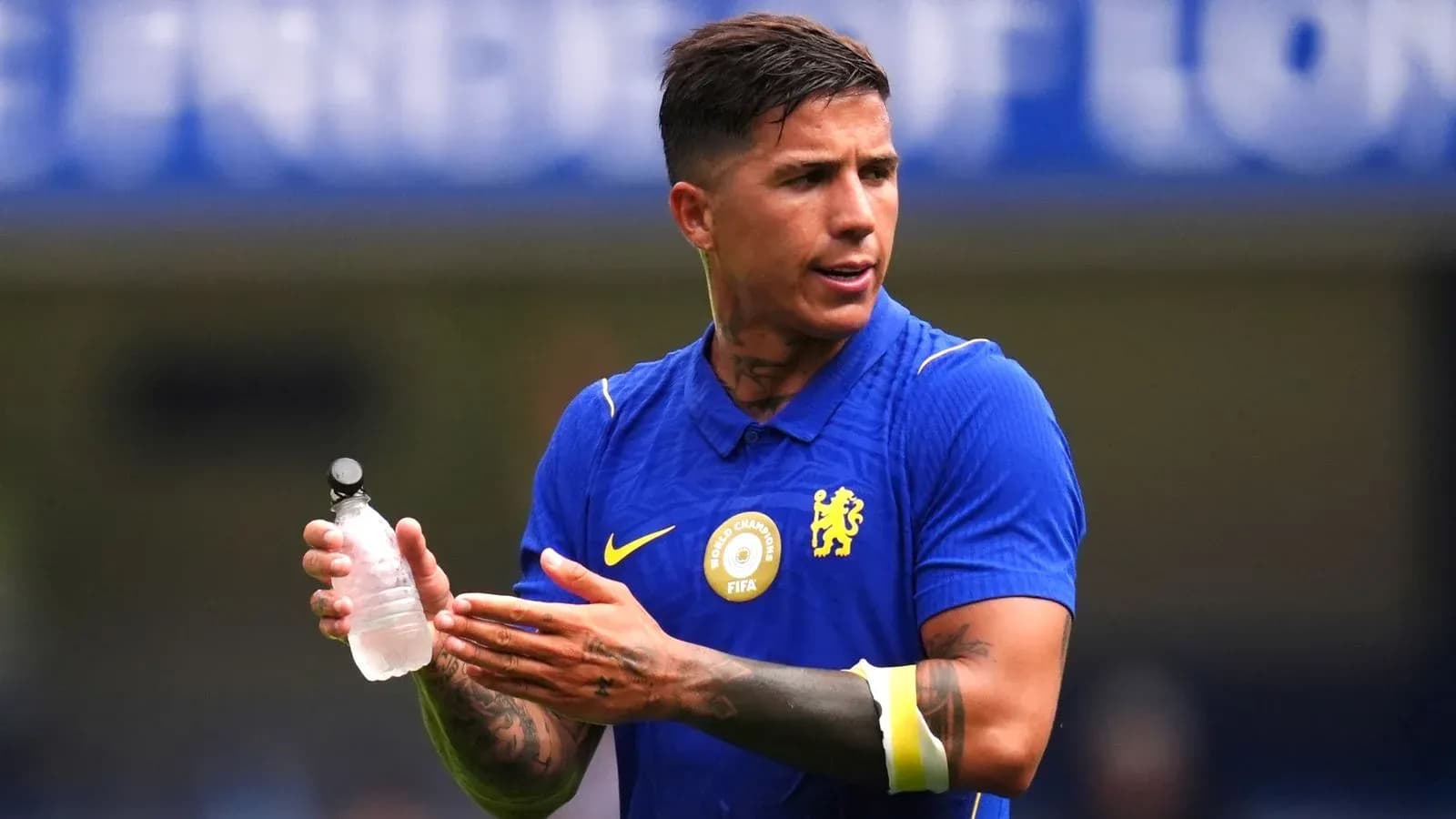 Player holding a water bottle during match