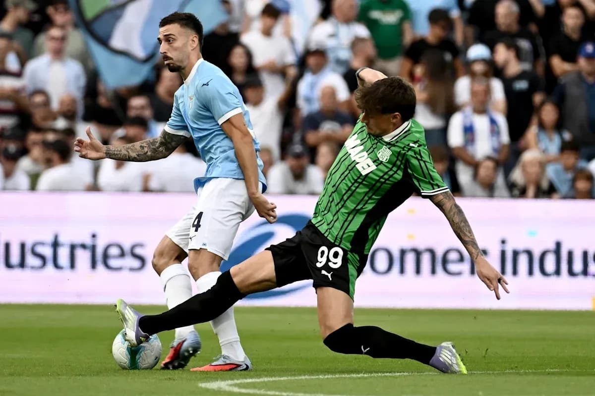 Two players competing for the ball during match