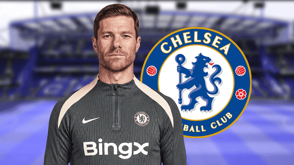 Coach in Chelsea FC training gear with club logo