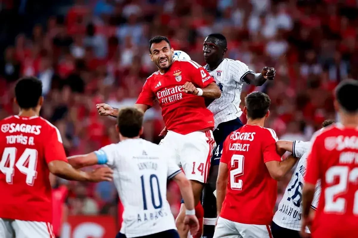 Players contesting for the ball during match