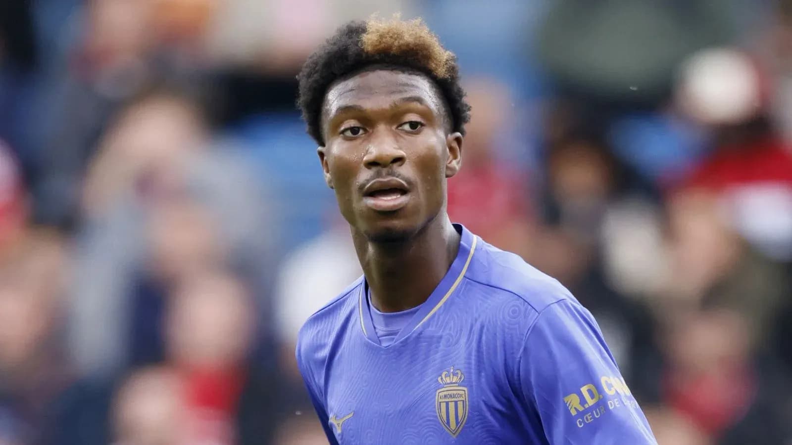 Monaco player looking towards the crowd during match
