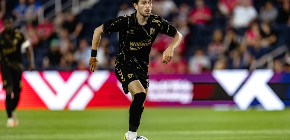 Player dribbling the ball during match