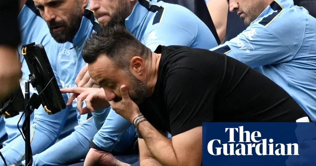 Coaching staff observing match on the bench