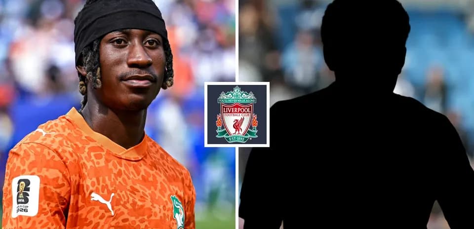 Goalkeeper in orange jersey before match with Liverpool logo