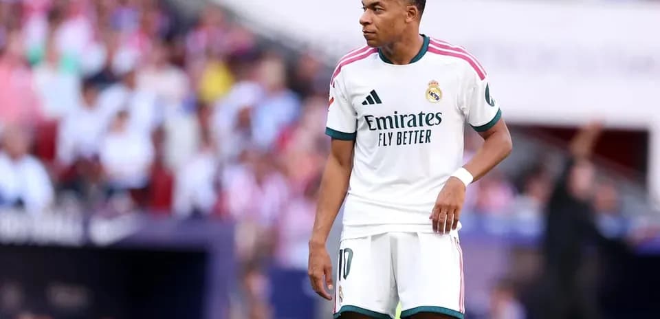 Player in Real Madrid kit on the field