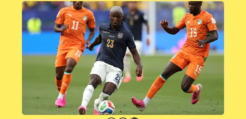 Player 23 dribbling the ball between two defenders