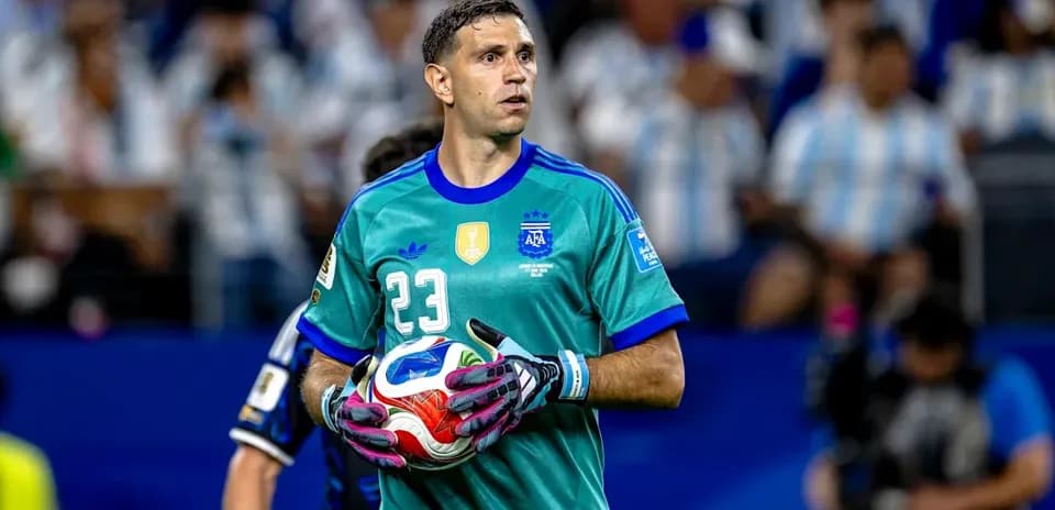 Goalkeeper holding the ball during a match
