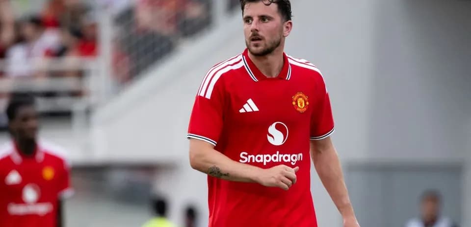 Player in red Manchester United jersey on the field