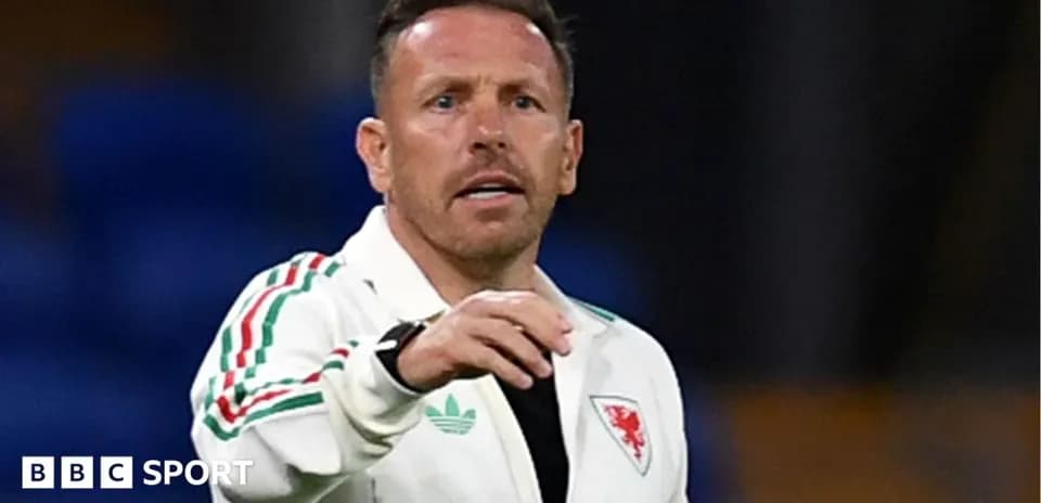 Wales manager gesturing during training session