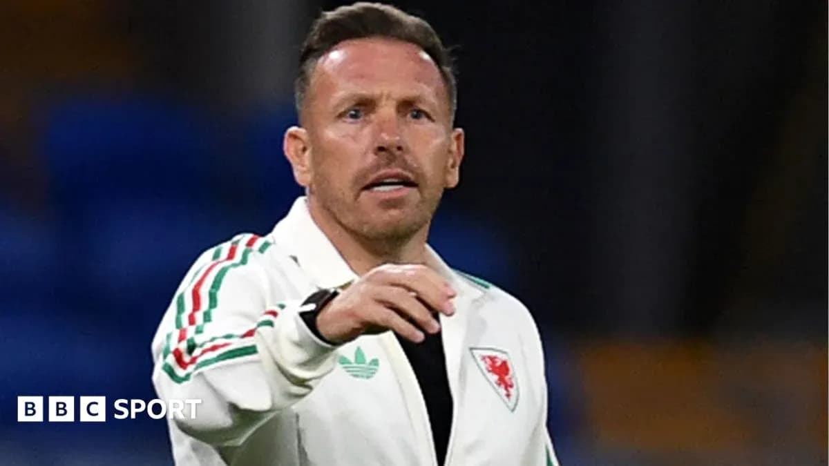 Wales manager gesturing during training session