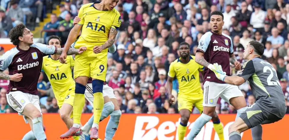 Richarlison heads the ball during Tottenham match