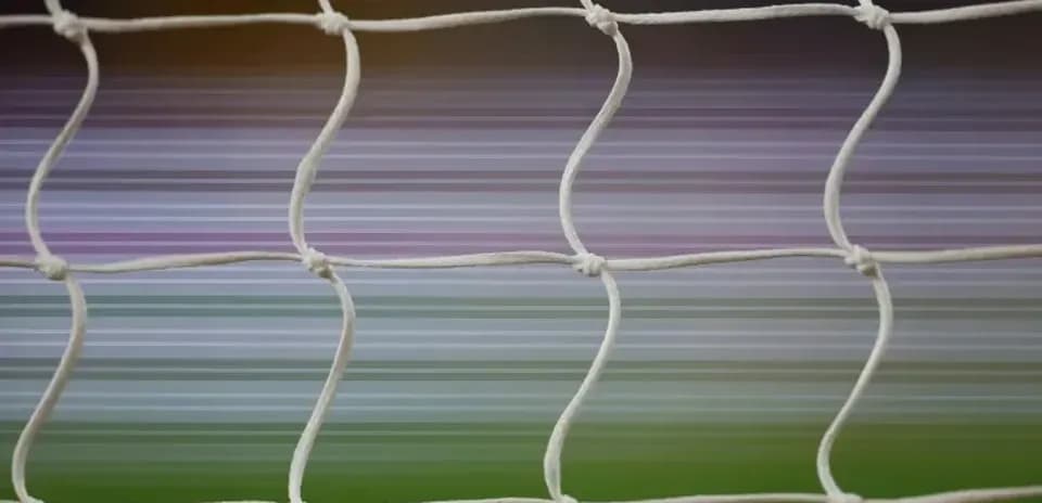 Close-up of a soccer goal netting