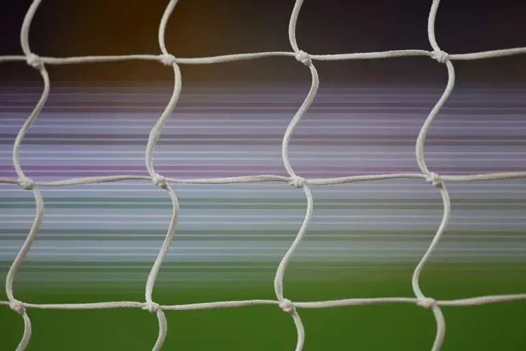 Close-up of a soccer goal netting